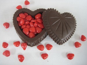 Chocolate heart box with cinnamon candies