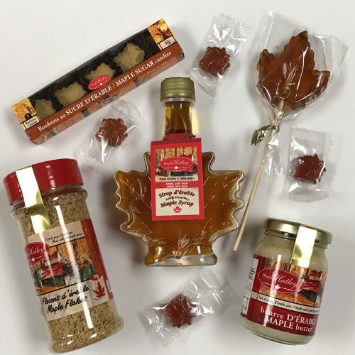 A selection of maple products including maple syrup and candies